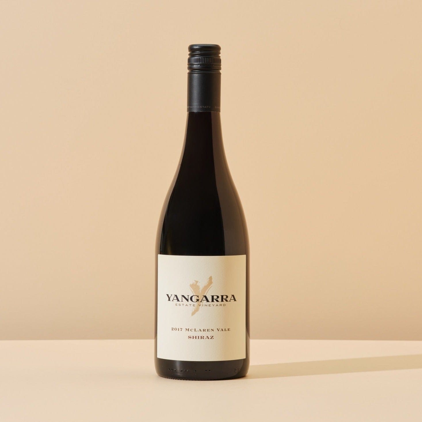 This image features Yangarra 2019 Shiraz, gifted in Handsel's 'Par None' bundle. Image is photographed with a natural background