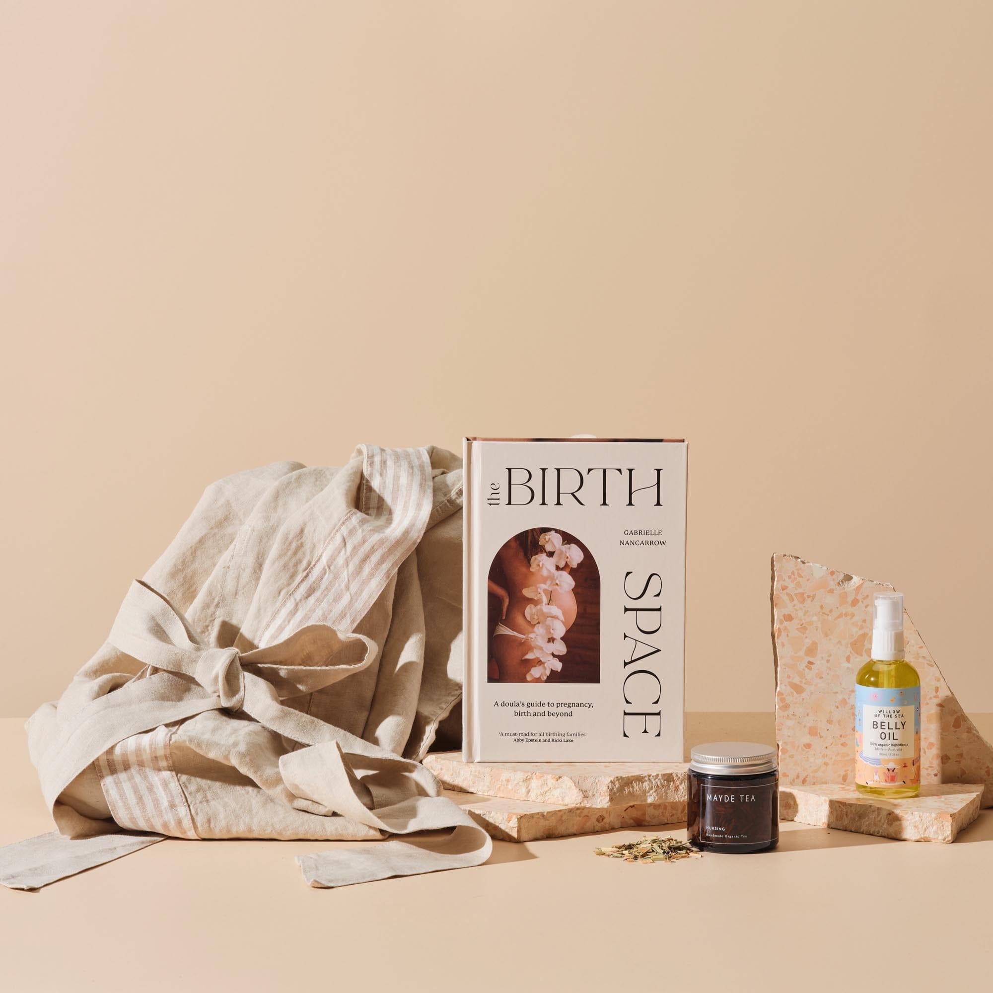This is the Hey Mama gift bundle from Handsel. Included in this image is The Birth Space, Belly oil, Mayde tea and a Linen Robe