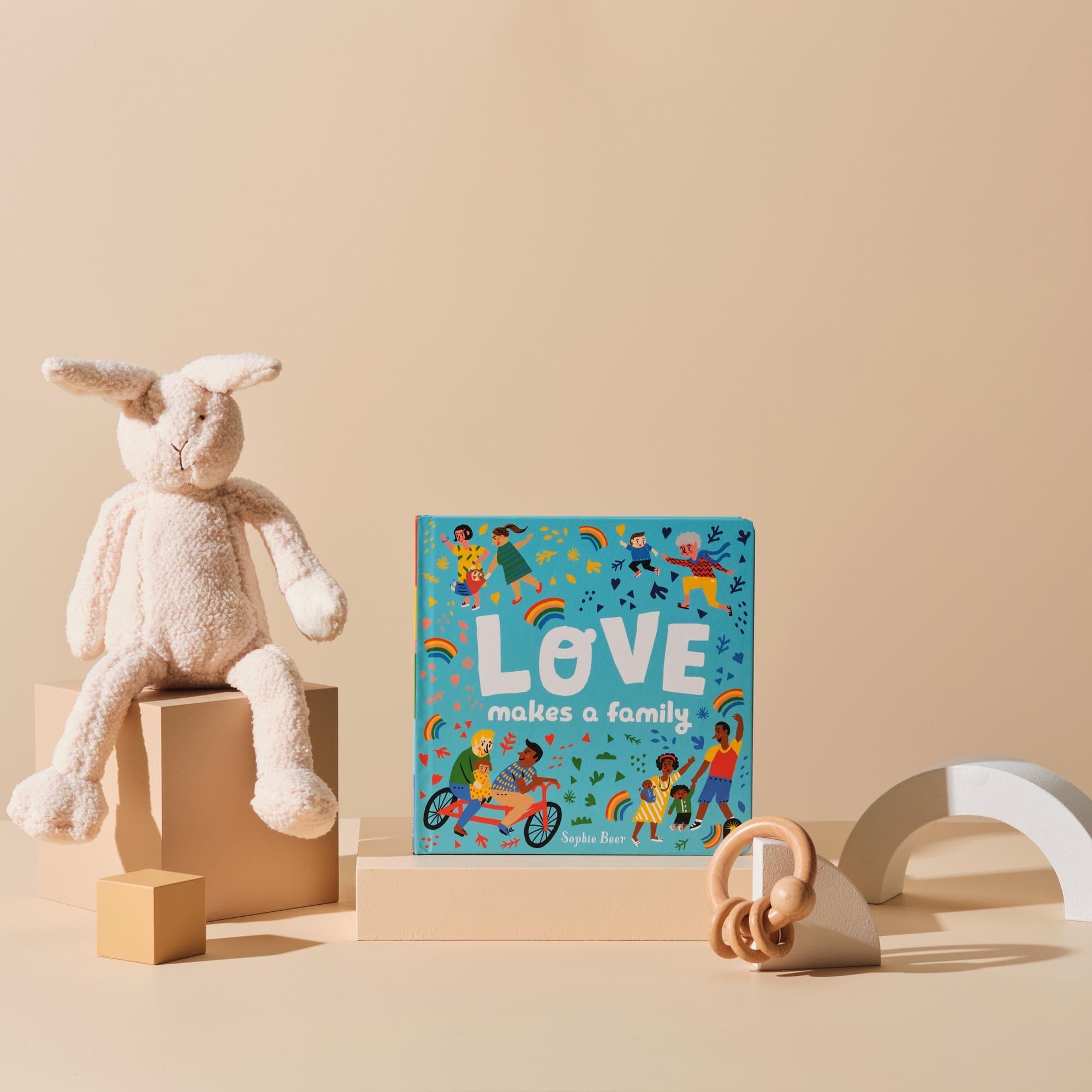 This is the Mum 'n' Bub gift bundle from Handsel. Included in this image is Love makes a family, Bonnie the Bunny and a teething ring
