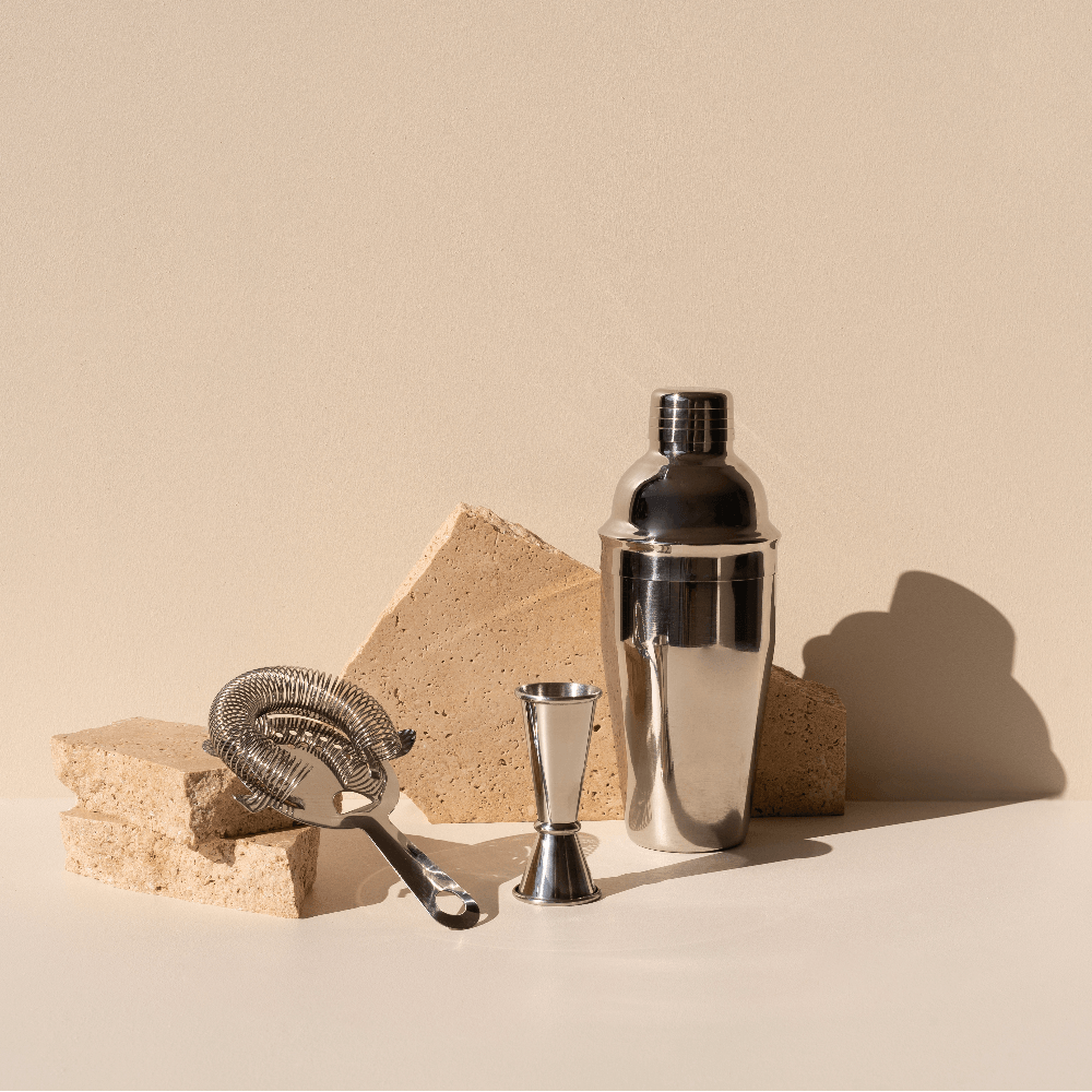 This image shows our cocktail shaker set, photographed with stone props 